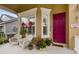 Inviting front porch with a colorful entry door, decorated windows, and cozy seating for relaxing at 4220 Cleary Way, Orlando, FL 32828