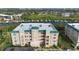 Aerial view of building and waterfront at 432 Bouchelle Dr # 102, New Smyrna Beach, FL 32169