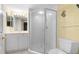 Bathroom includes a shower, toilet and a vanity with a mirror at 432 Bouchelle Dr # 102, New Smyrna Beach, FL 32169