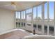 Sunroom with multiple windows, offering scenic views at 432 Bouchelle Dr # 102, New Smyrna Beach, FL 32169