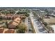 Aerial view of townhouses with playground and ample parking at 445 Fountainhead Cir # 164, Kissimmee, FL 34741