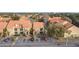 Aerial community view, building and parking visible at 445 Fountainhead Cir # 164, Kissimmee, FL 34741