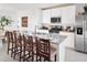 Modern kitchen with stainless steel appliances and an island at 4941 Kaia Ave, Winter Haven, FL 33884