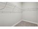 Walk-in closet with multiple rows of wire shelving for organized storage at 5003 Railroad Vine Aly, Winter Garden, FL 34787