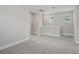 Upstairs bonus room featuring neutral walls, carpet and ample lighting at 5087 Railroad Vine Aly, Winter Garden, FL 34787