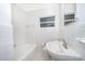 Clean bathroom, featuring a bathtub, sink, and toilet at 5416 Parkway Dr, Belle Isle, FL 32809