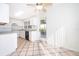 Kitchen with gray countertops, white cabinets, and tile floor at 5416 Parkway Dr, Belle Isle, FL 32809