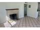 Living room features a brick fireplace and tile flooring at 5416 Parkway Dr, Belle Isle, FL 32809