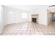 Living room with tile floor and brick fireplace at 5416 Parkway Dr, Belle Isle, FL 32809