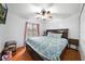 Main bedroom with king-size bed, and ample closet space at 5535 Long Lake Dr, Orlando, FL 32810