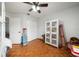 Spacious bedroom with hardwood floors and built-in storage at 5535 Long Lake Dr, Orlando, FL 32810