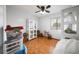 Well-lit bedroom with hardwood floors and ample closet space at 5535 Long Lake Dr, Orlando, FL 32810