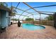 Relaxing screened pool and patio area at 5535 Long Lake Dr, Orlando, FL 32810