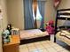 ' bedroom with bunk beds and bright decor at 5885 Dahlia Dr # 31/116, Orlando, FL 32807