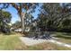 Cozy fire pit area in the backyard, perfect for entertaining at 7007 Seminole Dr, Belle Isle, FL 32812