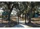 Entrance to Warren Park, featuring a walking path and park signage at 7007 Seminole Dr, Belle Isle, FL 32812