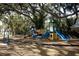 playground with slides and climbing structures at 7007 Seminole Dr, Belle Isle, FL 32812