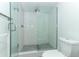 Clean shower with white subway tile and glass enclosure at 7007 Seminole Dr, Belle Isle, FL 32812