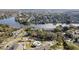 Aerial view of community near lake at 731 Sugar Bay Way # 103, Lake Mary, FL 32746