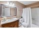 Clean bathroom with marble vanity and white bathtub at 731 Sugar Bay Way # 103, Lake Mary, FL 32746