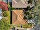 Top-down view of a single-Gathering home with a brown roof and surrounding landscape at 7895 Saint Giles Pl, Orlando, FL 32835