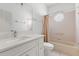 Bathroom featuring tub and shower combo, modern fixtures, and neutral walls at 7895 Saint Giles Pl, Orlando, FL 32835