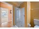 Bathroom with large shower and tiled floors at 7895 Saint Giles Pl, Orlando, FL 32835