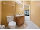 Clean bathroom with single sink vanity and toilet at 7895 Saint Giles Pl, Orlando, FL 32835