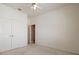 Bedroom with double doors and access to bathroom at 7895 Saint Giles Pl, Orlando, FL 32835