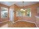 Bright dining area with a view to the backyard at 7895 Saint Giles Pl, Orlando, FL 32835