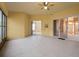 Bright sunroom with tiled floors and multiple access points at 7895 Saint Giles Pl, Orlando, FL 32835