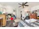 Bedroom featuring hardwood floors, bright windows and a ceiling fan at 7909 Chartreux Ln, Maitland, FL 32751