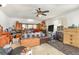 A spacious bedroom featuring a ceiling fan and lots of natural light at 7909 Chartreux Ln, Maitland, FL 32751