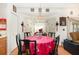 Cozy dining area with a charming chandelier and natural light at 7909 Chartreux Ln, Maitland, FL 32751