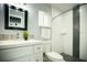 Renovated bathroom with modern vanity, shower, and mosaic tile accents at 884 Great Bend Rd, Altamonte Springs, FL 32714