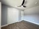 Spacious bedroom with double door closet and ceiling fan at 884 Great Bend Rd, Altamonte Springs, FL 32714