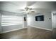 Bright living room with hardwood floors and a ceiling fan at 884 Great Bend Rd, Altamonte Springs, FL 32714