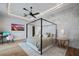 Main bedroom with four-poster bed and hardwood floors at 9122 Bay Point Dr, Orlando, FL 32819