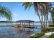 Private boat dock with covered seating area at 9122 Bay Point Dr, Orlando, FL 32819