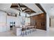 Modern kitchen with island and wood beam ceiling at 9122 Bay Point Dr, Orlando, FL 32819