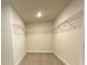 Large walk-in closet with wire shelving at 1012 Anchorage Street, Leesburg, FL 34748