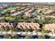 Aerial view of community featuring houses and lush landscaping at 10329 Belfry Cir, Orlando, FL 32832