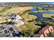 Golf course community with clubhouse and lake views at 10329 Belfry Cir, Orlando, FL 32832