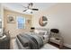 Bright bedroom with a comfortable bed and neutral decor at 10329 Belfry Cir, Orlando, FL 32832