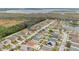 Aerial view of houses near a waterway and marshland at 1122 Hacienda Cir, Kissimmee, FL 34741