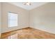 Simple bedroom with tile flooring and a window with blinds at 1122 Hacienda Cir, Kissimmee, FL 34741