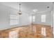 Spacious dining room with tile floors and a chandelier at 1122 Hacienda Cir, Kissimmee, FL 34741