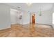 Bright dining room with tile floors and two chandeliers at 1122 Hacienda Cir, Kissimmee, FL 34741