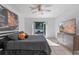 Bedroom featuring a decorative print, TV, and french doors leading to a serene outdoor view at 1254 Seminola Blvd, Casselberry, FL 32707