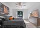 Serene bedroom featuring a comfortable bed, modern furnishings, and french doors to the outside at 1254 Seminola Blvd, Casselberry, FL 32707